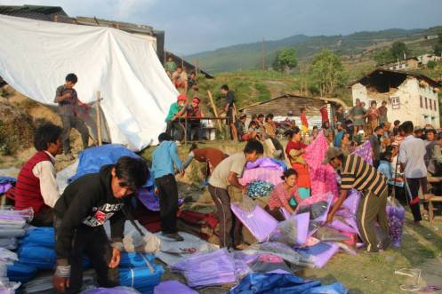 Distributing shelter kits in Bhotenamlang village - May 2015