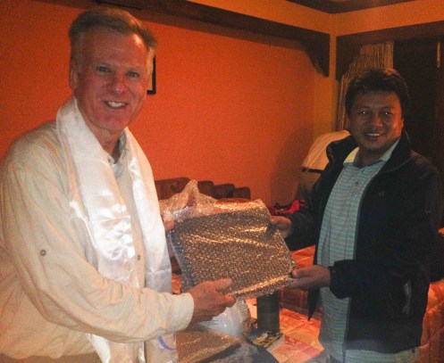 Craig Miller delivering laptops to HELP's Jimmy Lama, October 2015